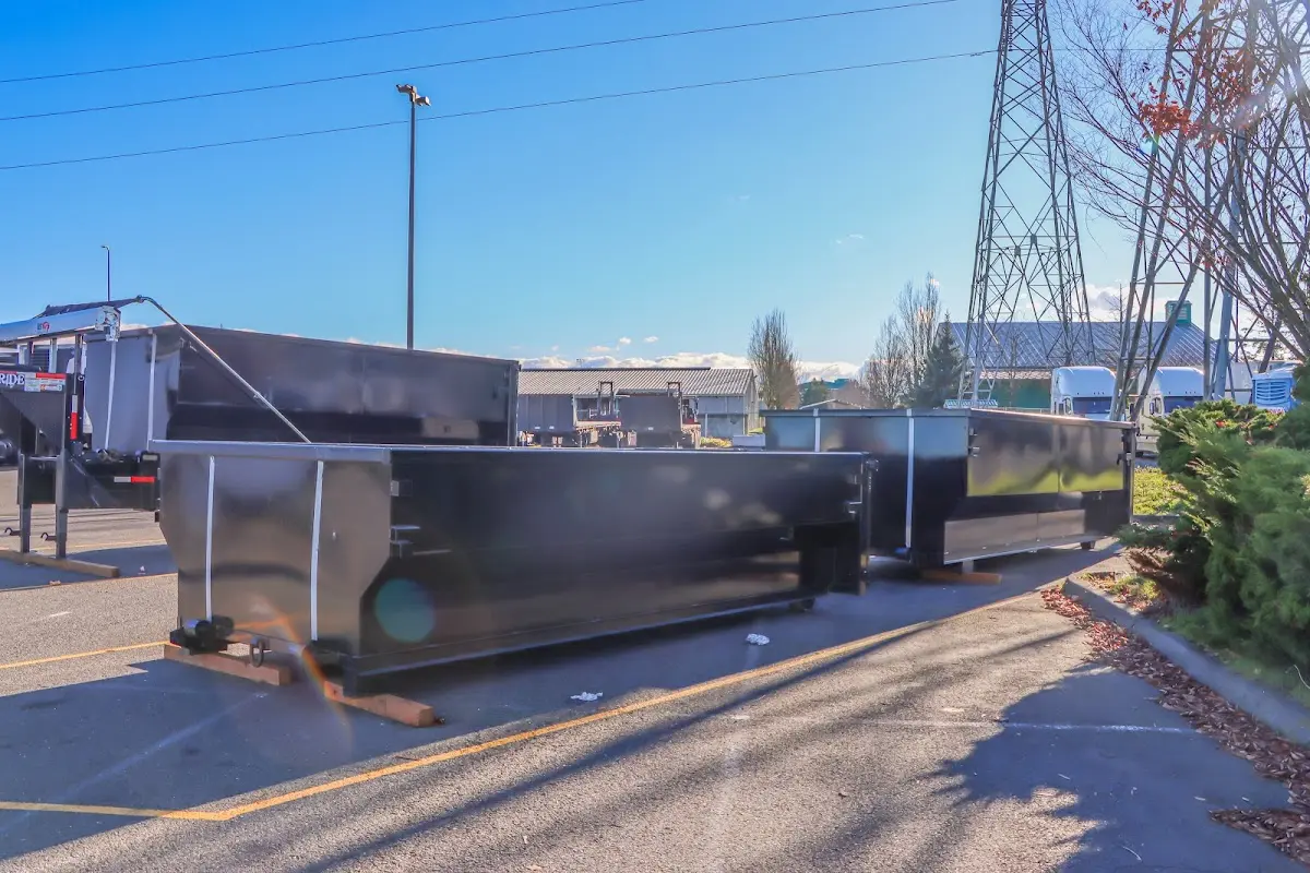 Roll-off dumpster ready for waste disposal at job site for 15 Yard Dumpster Rental in Spencer